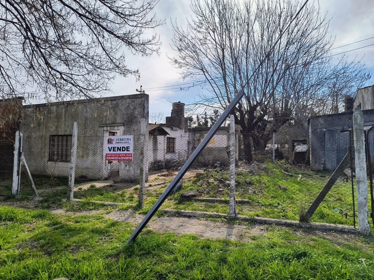 AMPLIO TERRENO CON MEJORAS